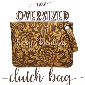 Oversized clutch purse